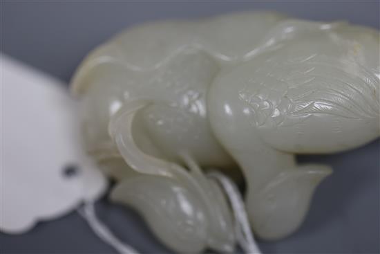 A good Chinese white jade group of two mandarin ducks biting lotus tendrils, 18th/19th century, L. 7.2cm